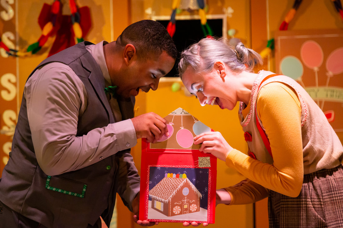 Two actors excited about the envelope they've just opened